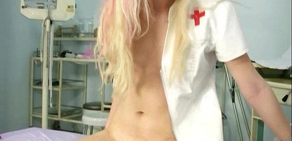  Blond junior nurse Kristyna inserts speculum in her pussy